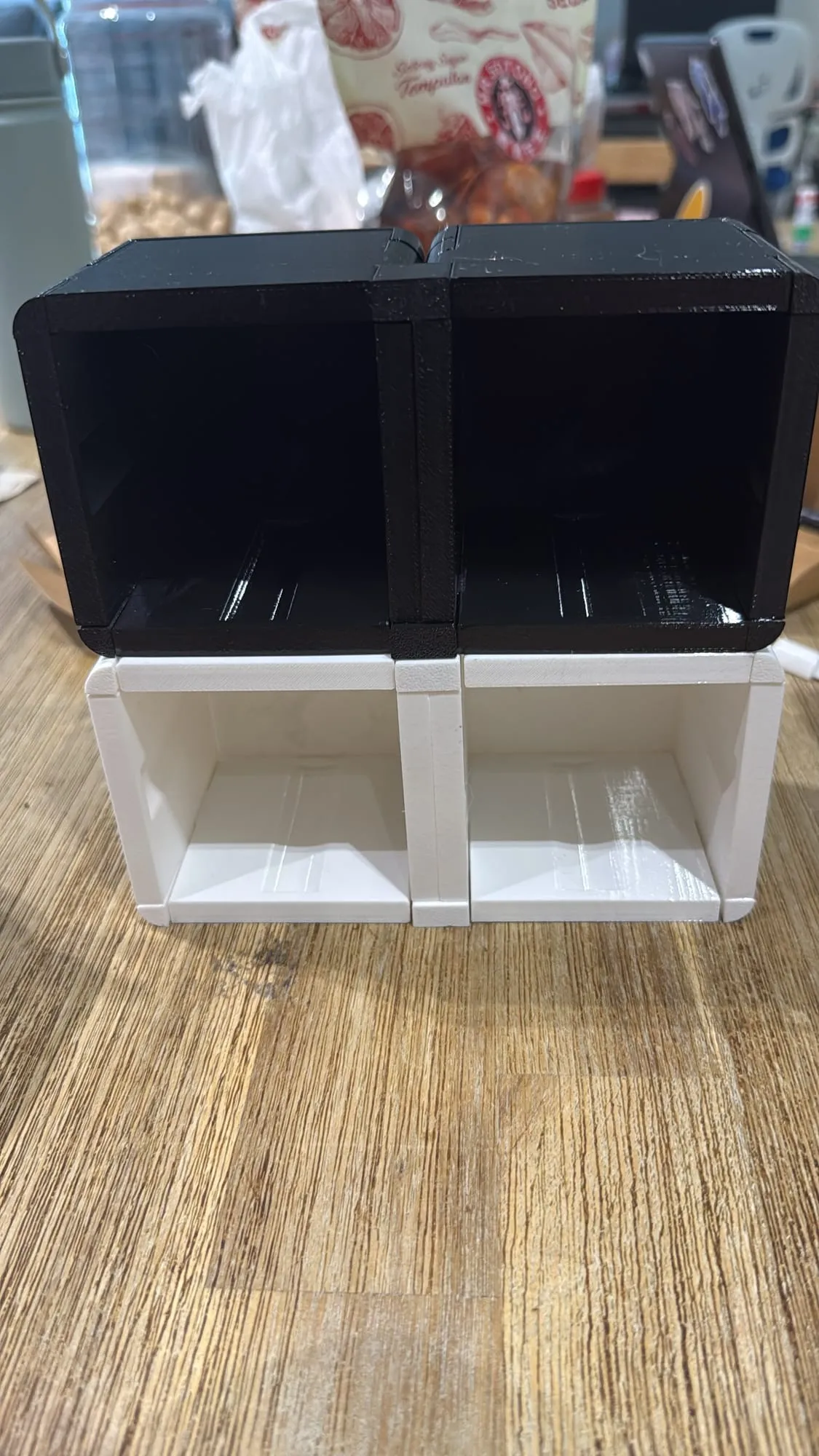 Black and white ThrowGRID cubes stacked together