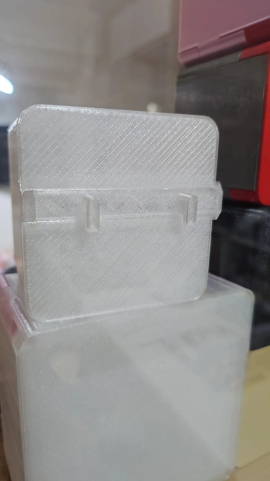 A clear press-fit front panel prototype for a ThrowGRID cube